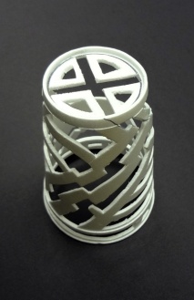 Create a sculpture by deconstructing a styrofoam cup.